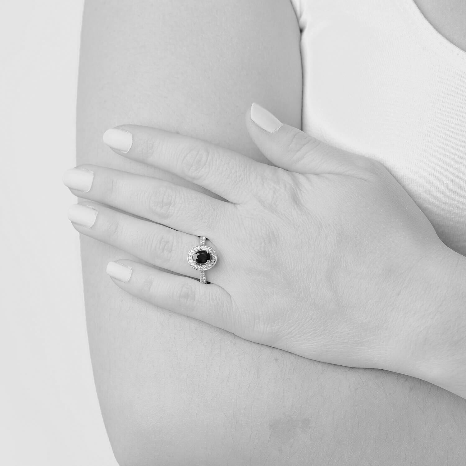 9ct White Gold Diamond Halo and Oval Sapphire Ring