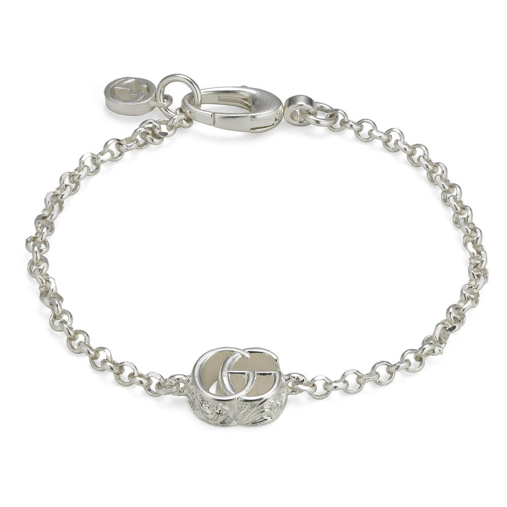 Gucci Bracelet with Gucci Trademark Engraved Charms in Metallic