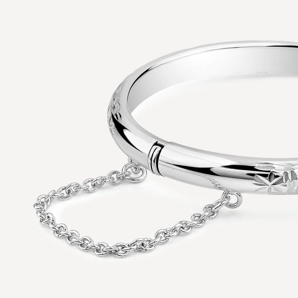 Sterling Silver Lines & Flower Engraved Safety Chain Baby Bangle image number 1