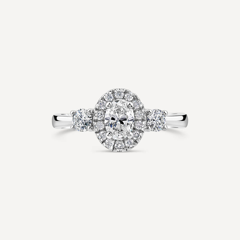 Platinum 0.72ct Oval Halo & 2 Side Stones Diamond Engagement Ring image number 1
