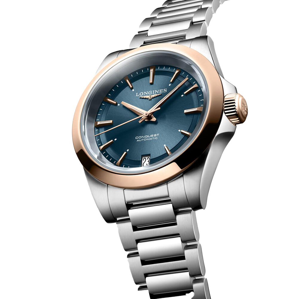 Longines Conquest 34mm Blue Dial Rose Gold Bezel Steel Bracelet Watch image number 1