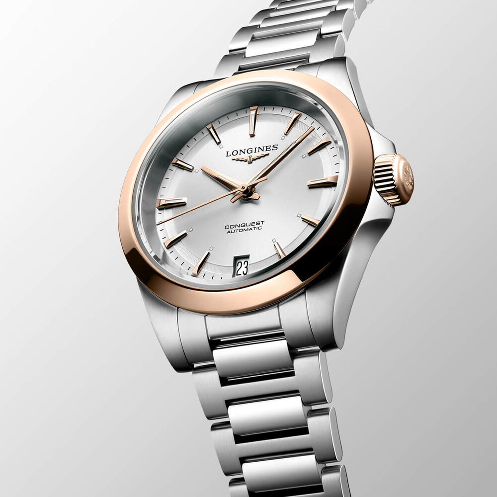 Longines Conquest 34mm Silver Dial Pink Gold Case Steel Bracelet Watch image number 1