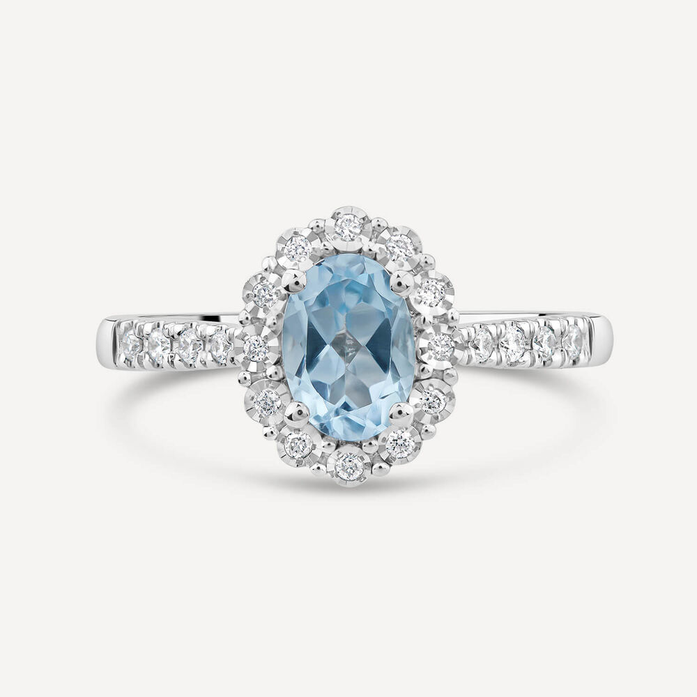 9ct White Gold Oval Blue Topaz 0.13ct Diamond Cluster & Shoulders Ring