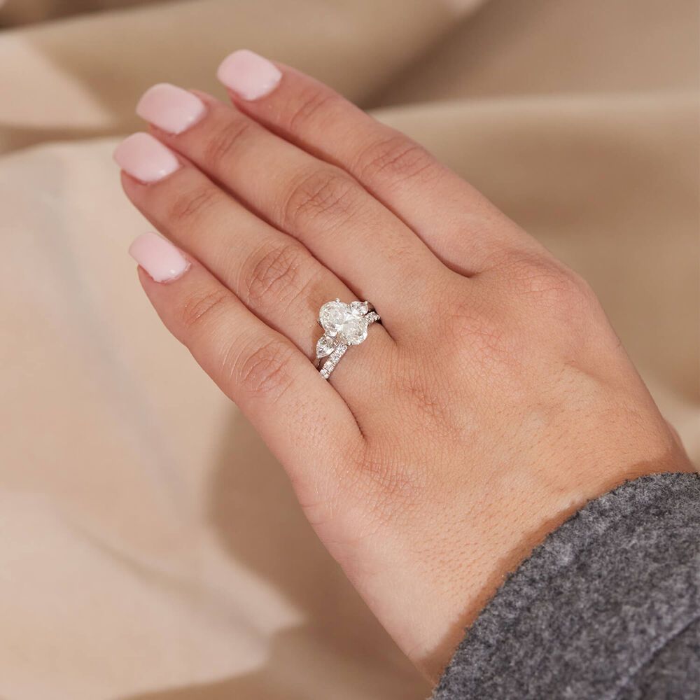 Born Platinum 2.40ct Lab Grown Oval Centre & Pear Sides Diamond Ring image number 9
