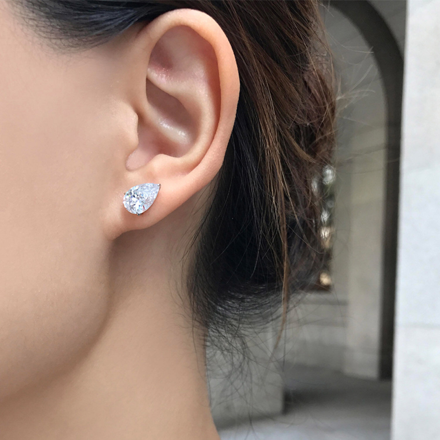 CARAT London 9ct White Gold Pear Shape Stud Earrings at Fraser Hart