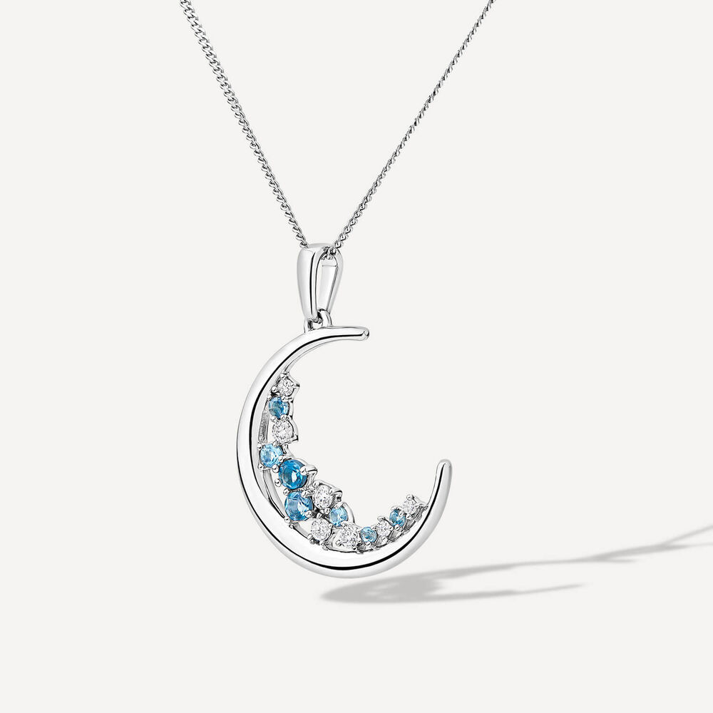 9ct White Gold Blue Topaz & Diamond Set Half Moon Pendant image number 1