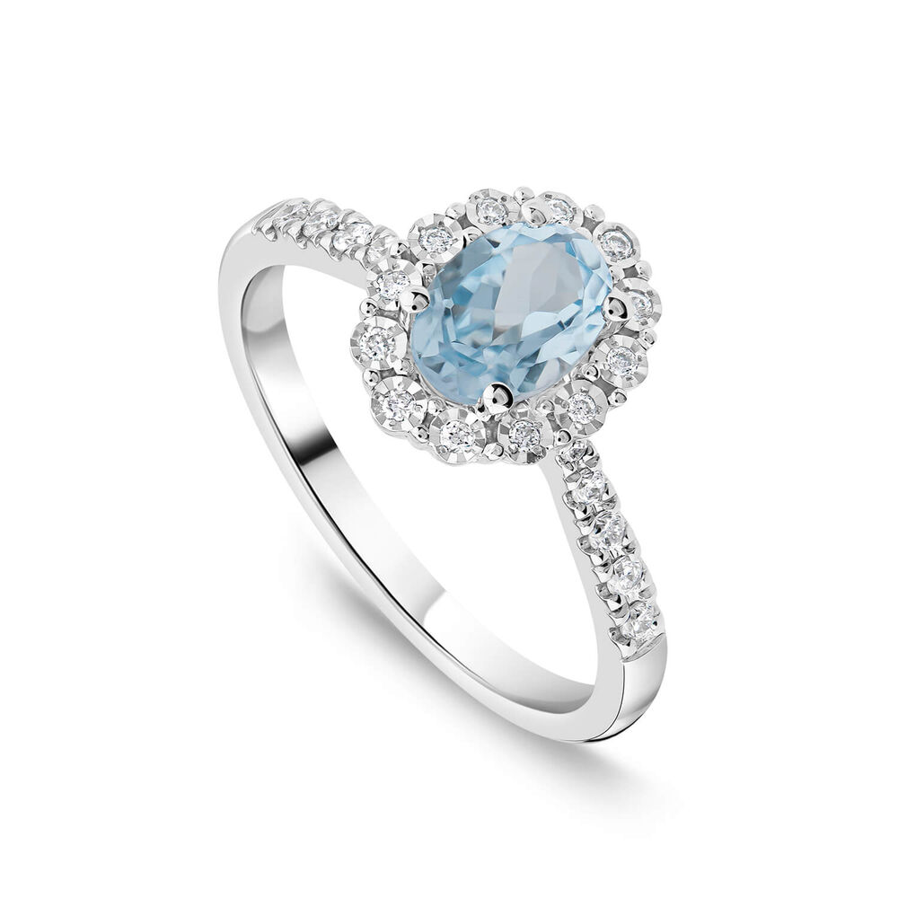 9ct White Gold Oval Blue Topaz 0.13ct Diamond Cluster & Shoulders Ring