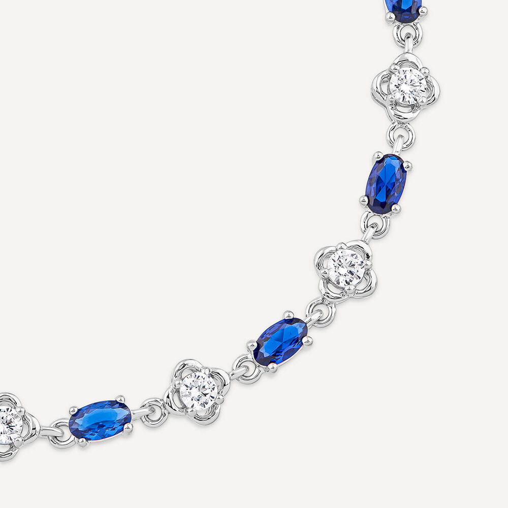 Sterling Silver Cubic Zirconia Flower & Blue Stone Bracelet image number 1