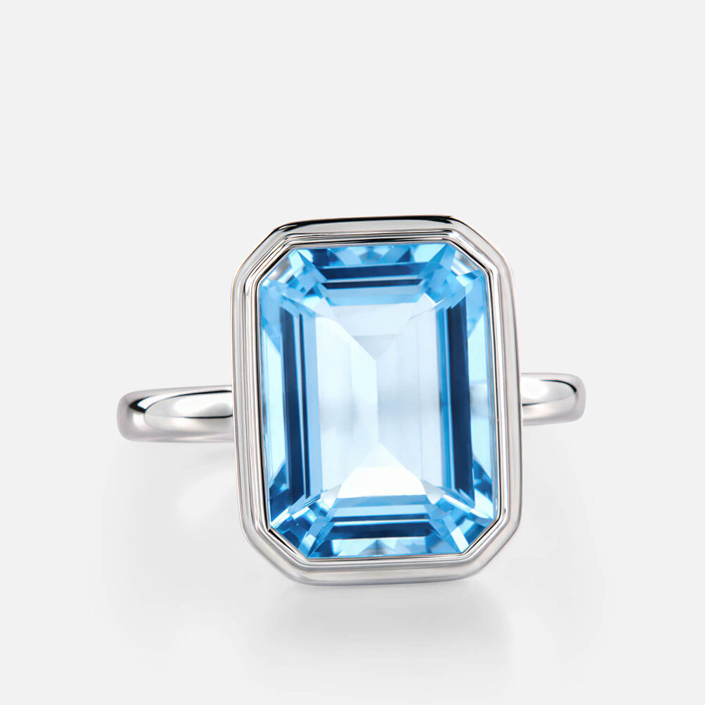 Sterling Silver Rectangular Blue Topaz Bezel Set Ring