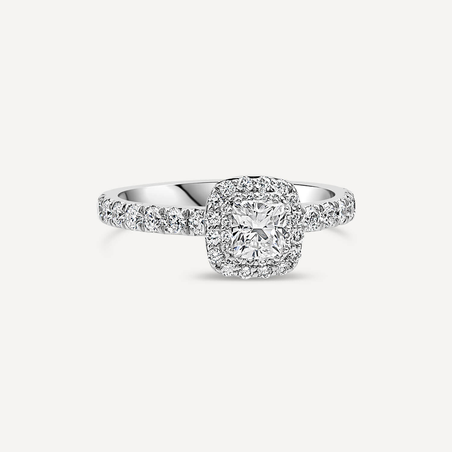 18ct white gold 1ct diamond cushion top halo bridal set