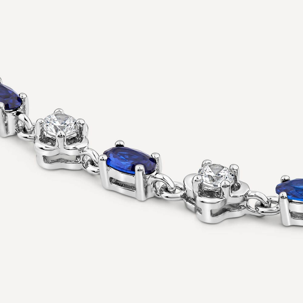 Sterling Silver Cubic Zirconia Flower & Blue Stone Bracelet image number 2