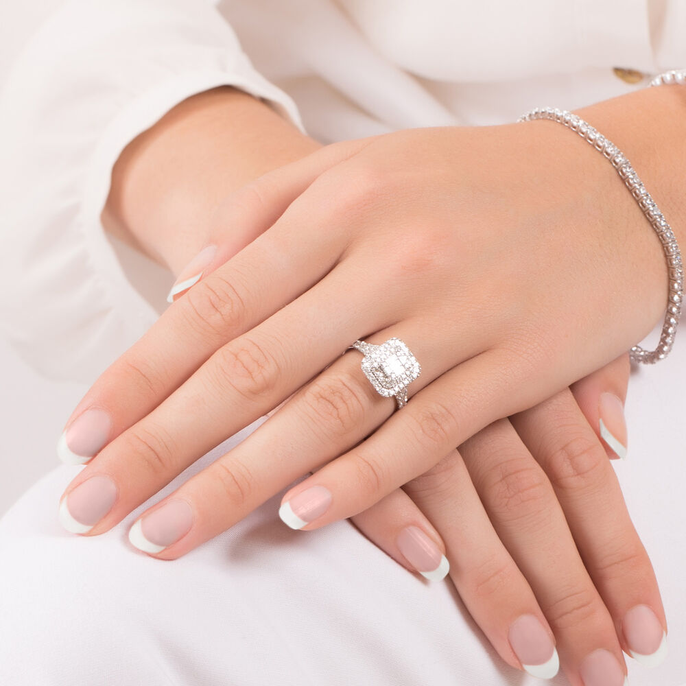 18ct White Gold 1.00 Carat Baguette and Round Brilliant Diamond Halo Cluster Ring image number 5