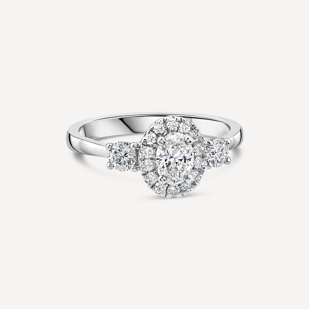 Platinum 0.72ct Oval Halo & 2 Side Stones Diamond Engagement Ring image number 2