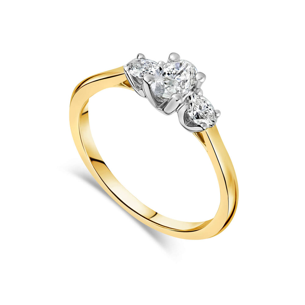 18ct Yellow Gold Three Stone Oval Centered 0.66 Carat Diamond Ring