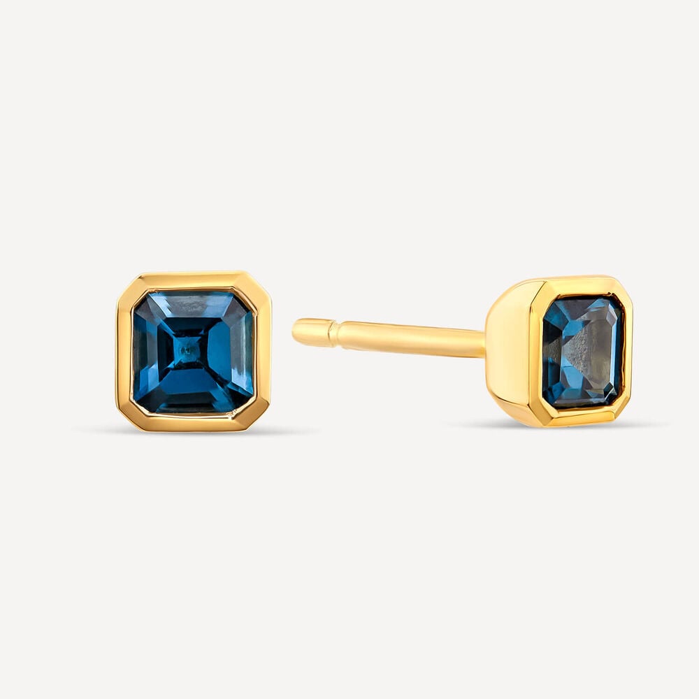 9ct Yellow Gold Cushion Blue Topaz Stud Earrings image number 1