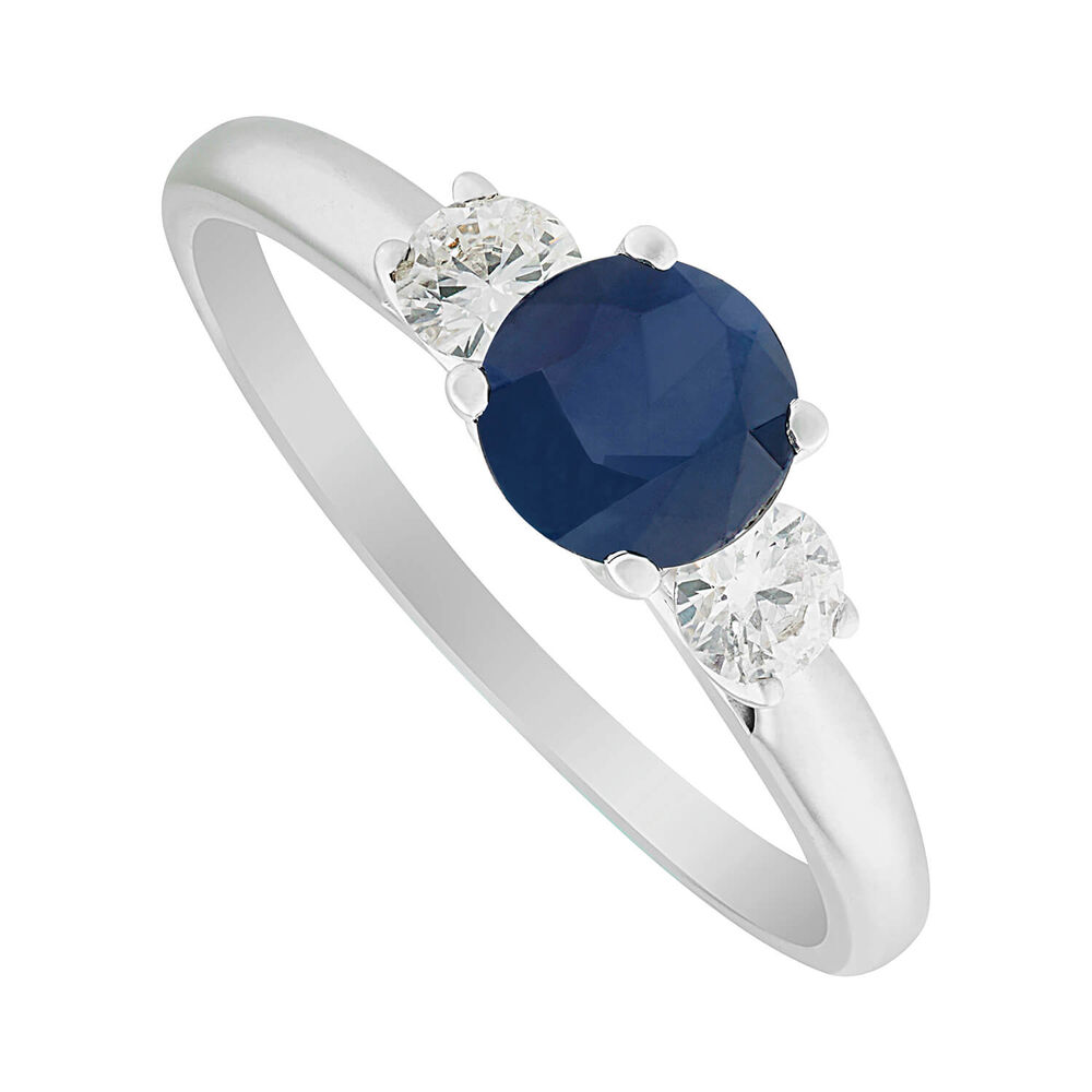 18ct white gold sapphire and 0.24 carat diamond three stone ring