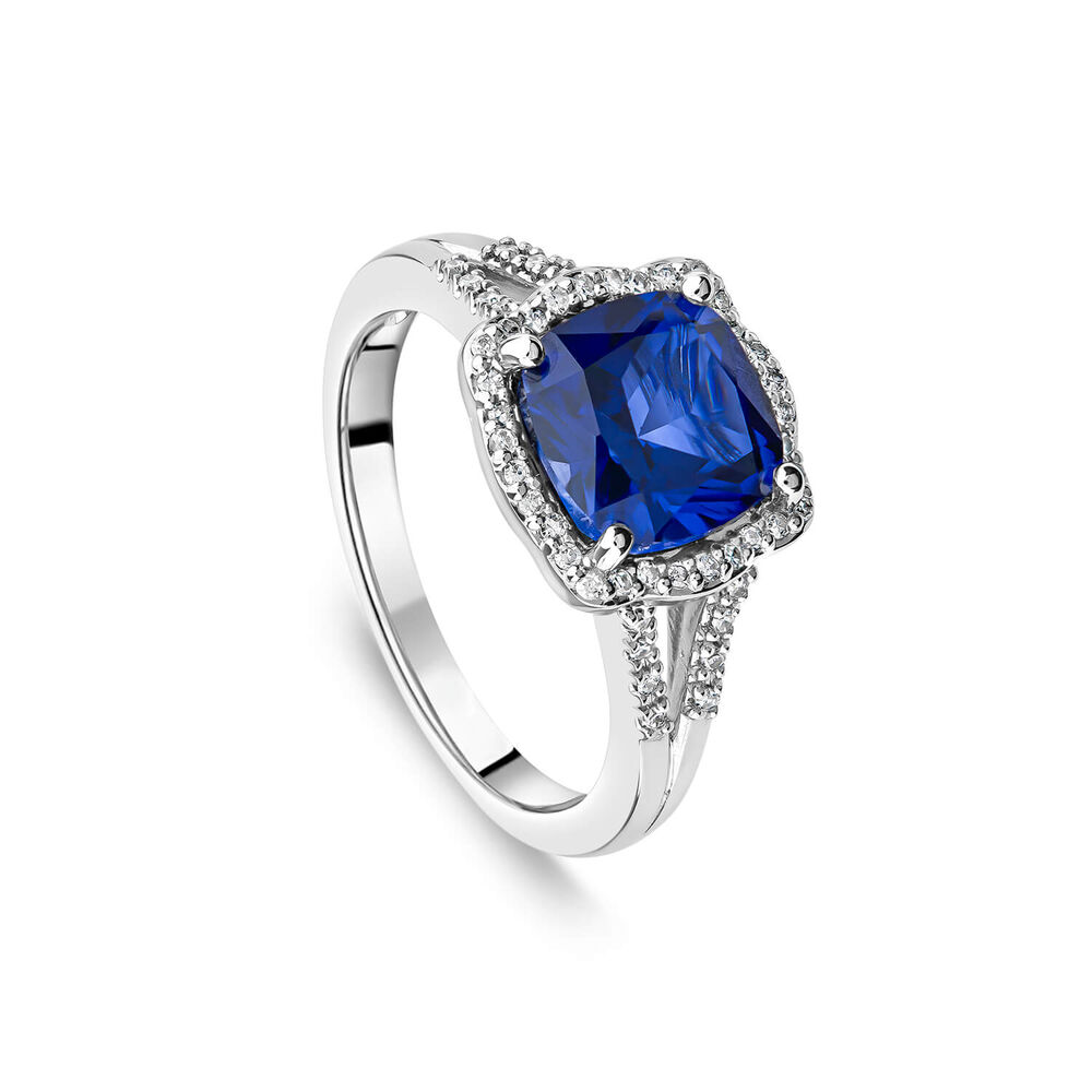 9ct White Gold 0.15ct Diamond and Created Sapphire Halo Ring image number 0