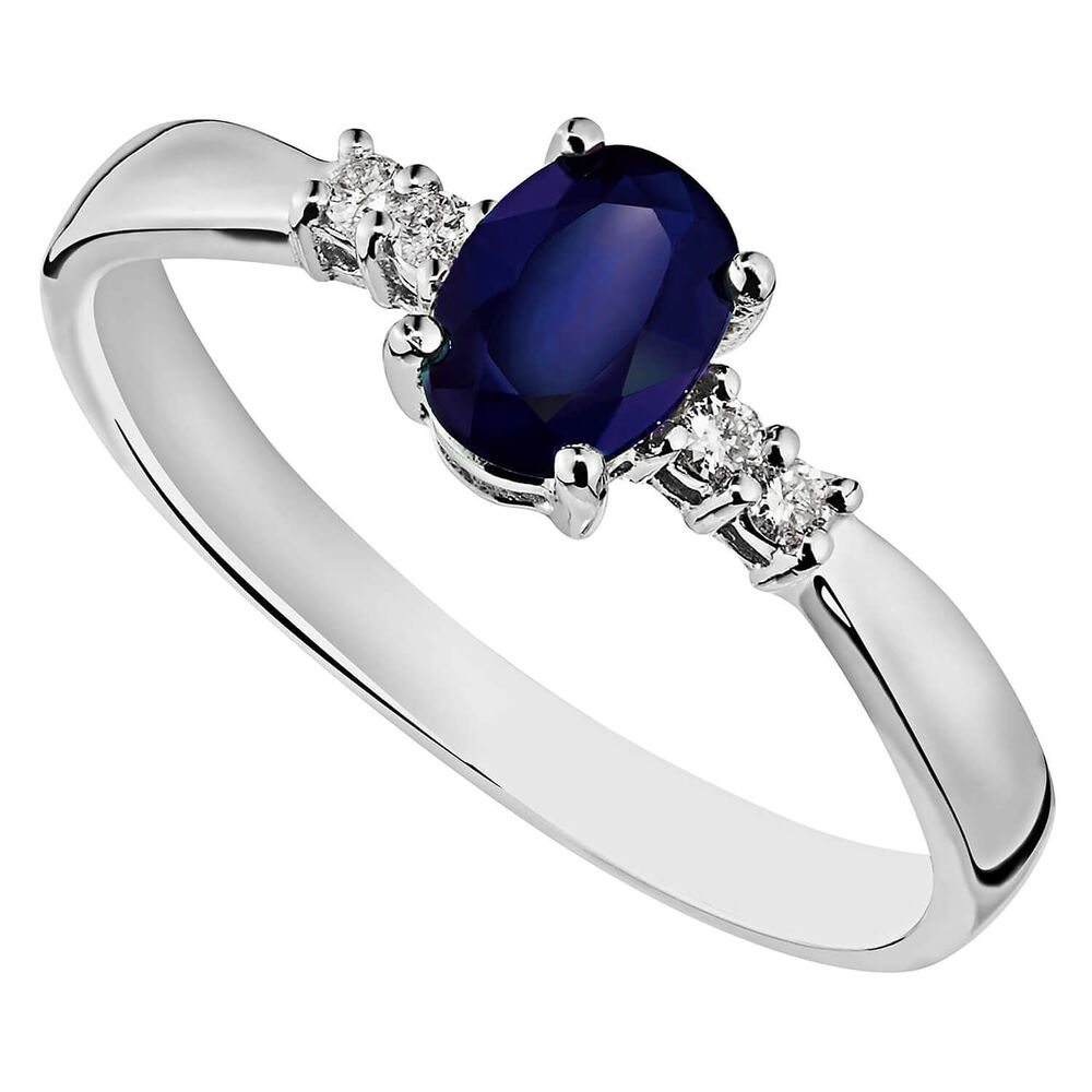 9ct white gold oval sapphire and diamond side-stone ring